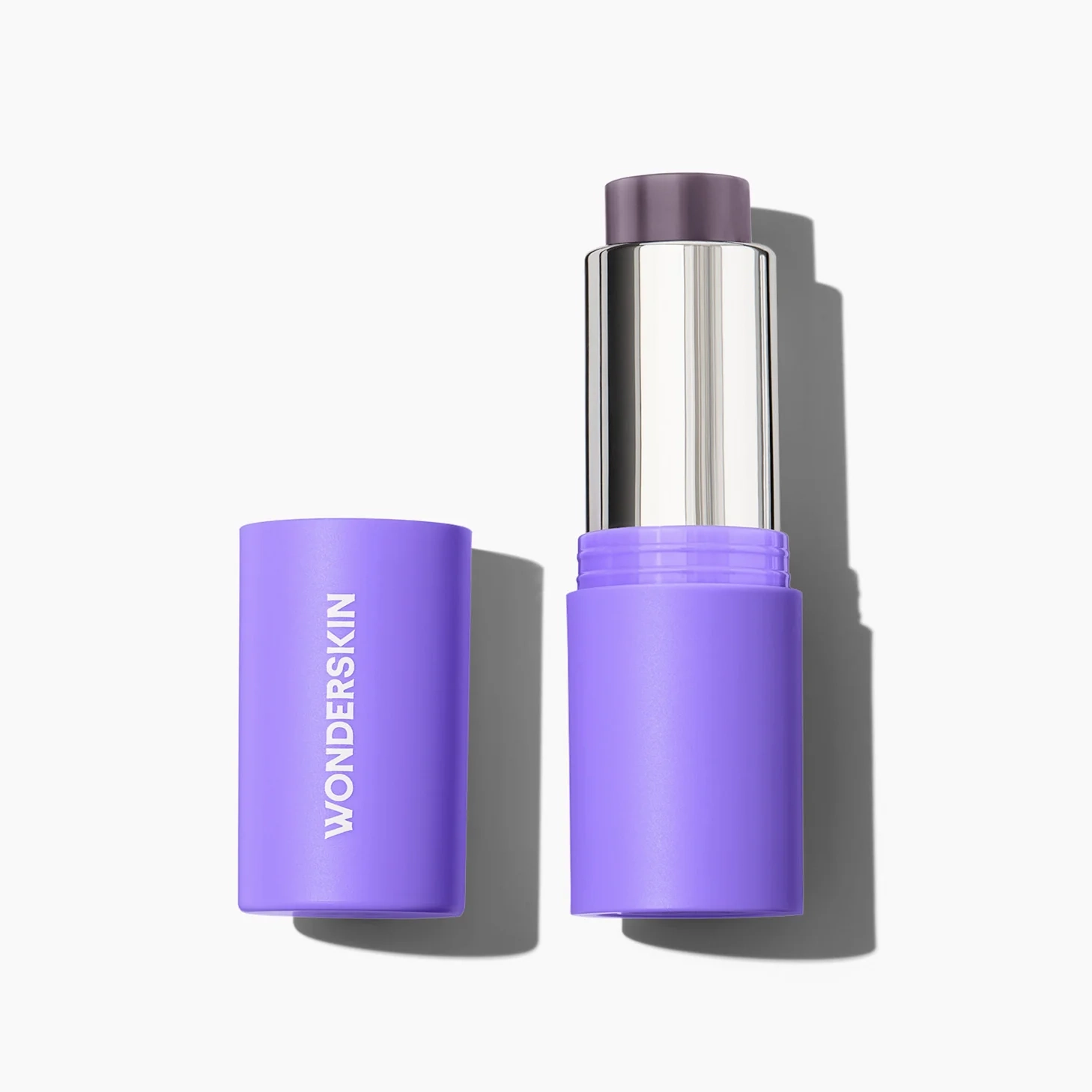 Purple Phlush Stick with its cap beside it